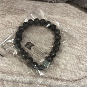 Stylish Black Beaded Bracelet with Green Accent